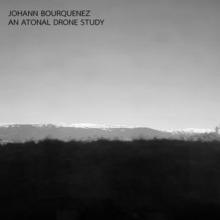 the Jura mountains covered by snow, seen from a train, in black and white
